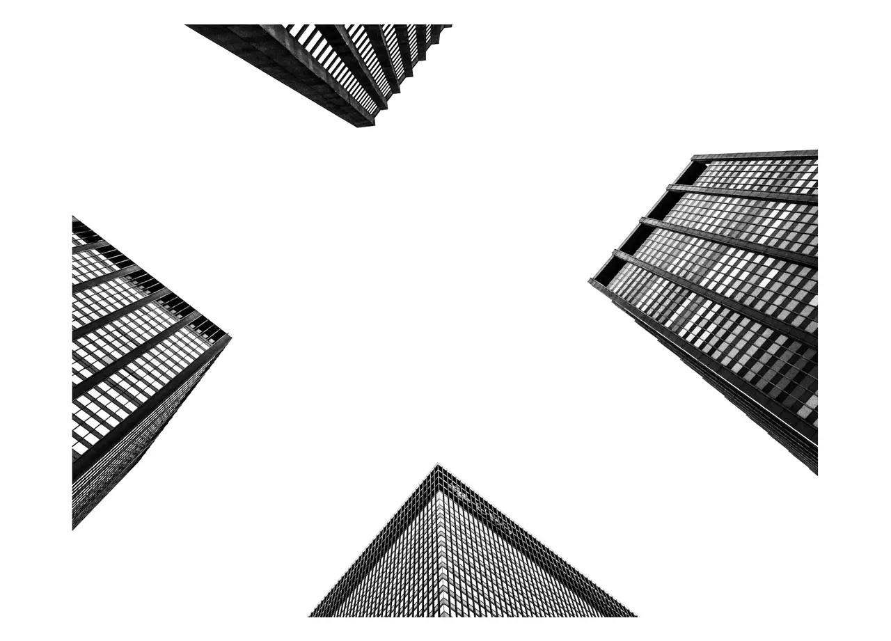 Person working at a laptop in a modern office